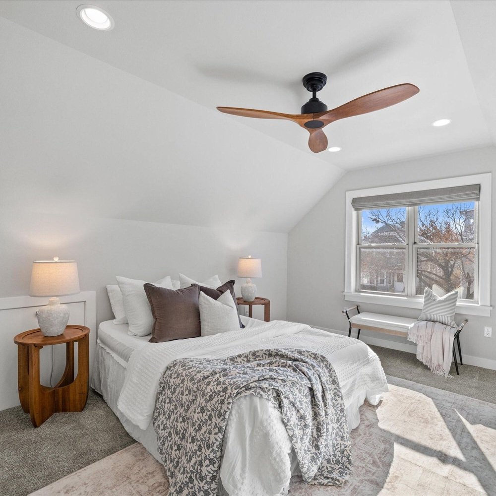 Occupied living room updated with select decor and furniture edits before listing 2